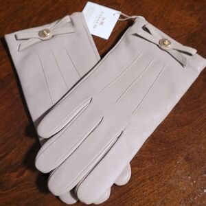 Coach White and Gold Tag